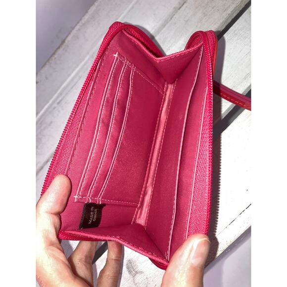 COACH SMALL TAN CANVAS SIGNATURE AND PINK LEATHER WRISTLET - Picture 7 of 9